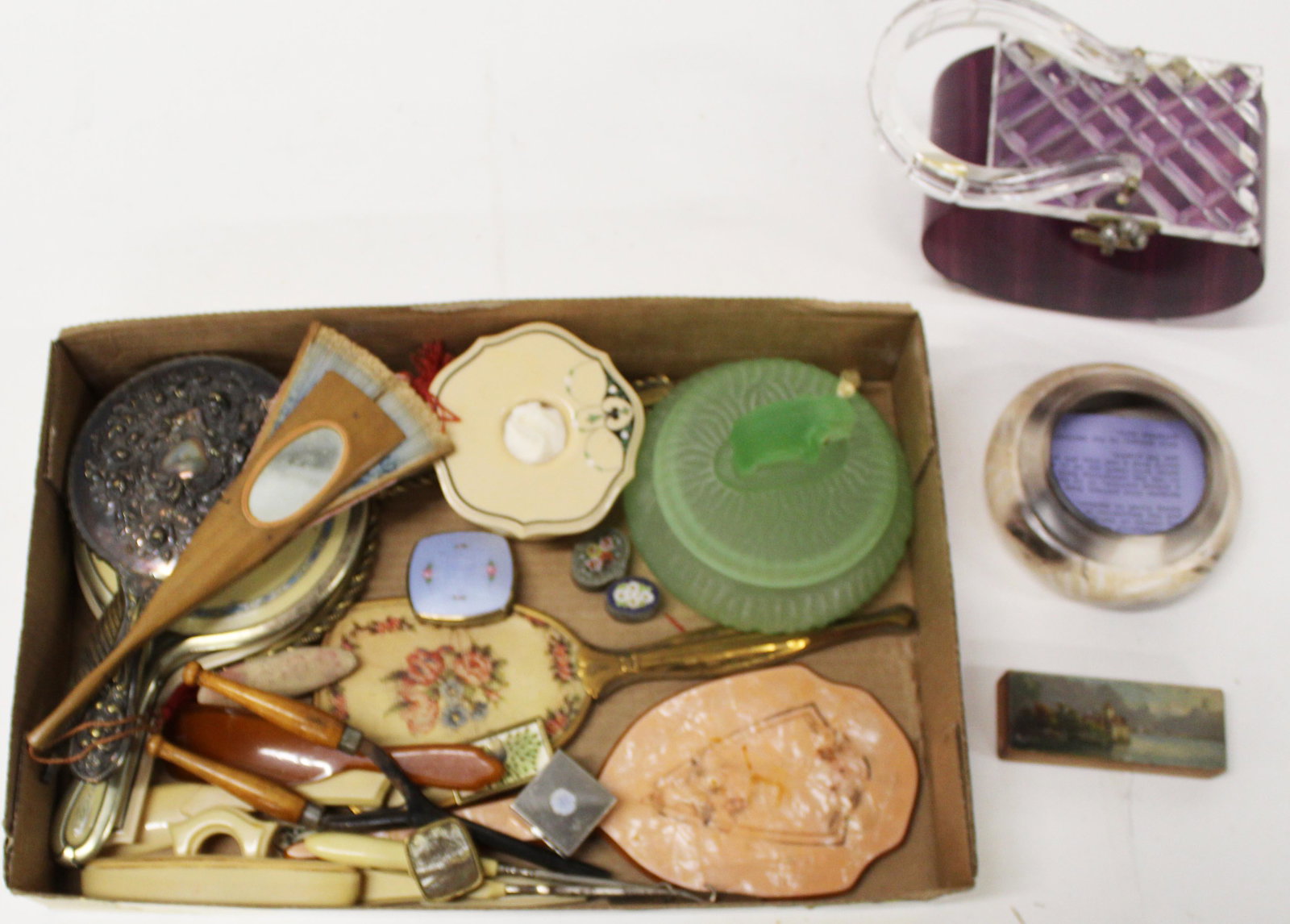 Group of Vintage Ladies Vanity Accessories: Group of Vintage Vanity Items and Ladies Accessories including 1940's Lucite handbag, green frosted glass covered powder jar with elephant, wooden souvenir novelty folding fan with inlaid mirror, pill