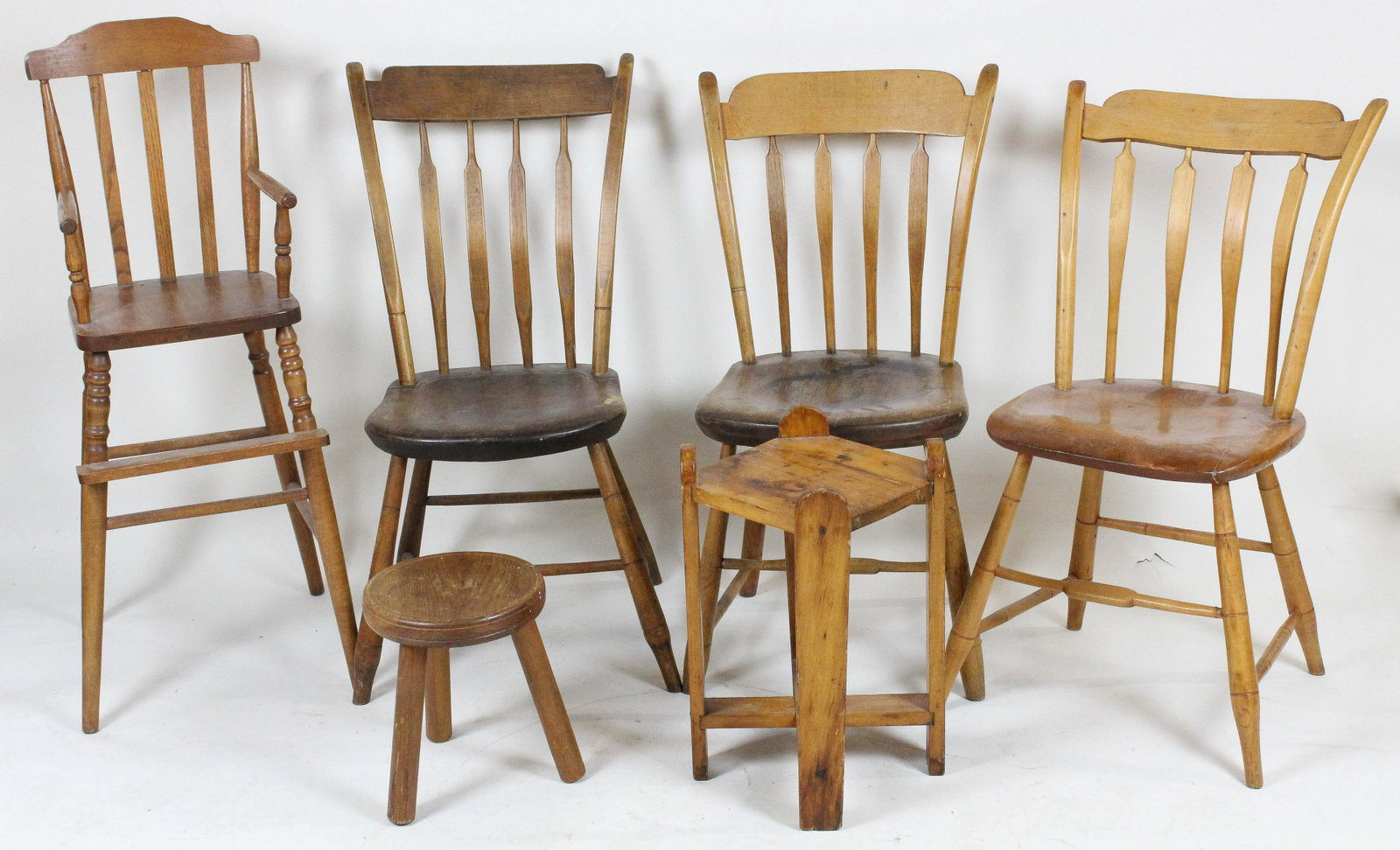 A group of chairs: A group of 5 chairs and stools including 2 rabbit ear Windsors, milk stool, high chair, and other stool