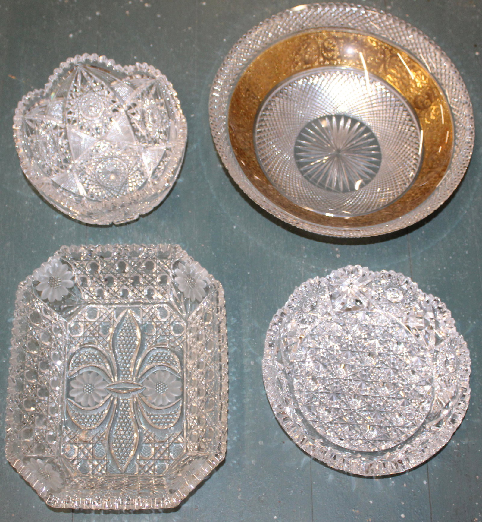 4 pcs. Fine Brilliant Cut Glass Tableware: 4 pcs. Fine Brilliant cut glass tableware including unusual octagonal serving dish with fleur de lis cutting, two American Brilliant Period round serving bowls, and large diamond cut centerpiece bowl 