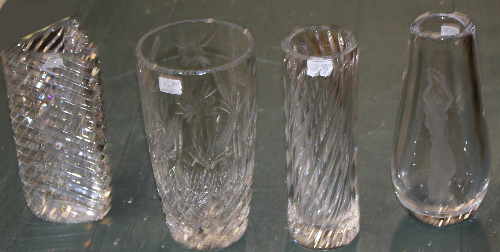 4 Mid Century Modern Crystal Vases incl. Orrefors: Group of 4 Mid-Century Modern crystal vases including two signed Orrefors Swedish crystal, one signed Regina (?) -some nicks ht. 8"-8.75"