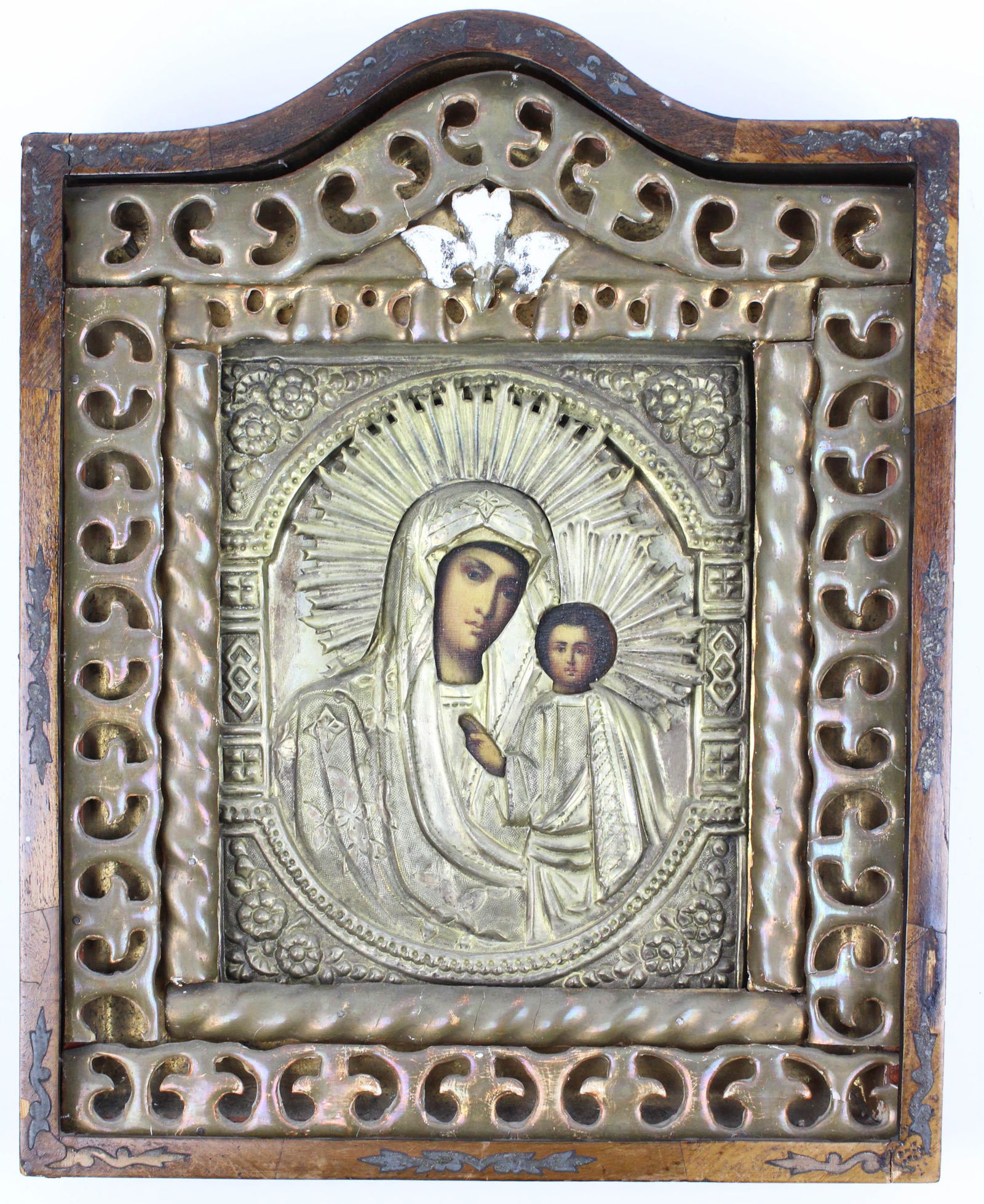 Ca 1900 Russian Icon with Madonna and Child: Ca 1900 Russian handpainted icon depicting the Madonna & Child, brass riza, walnut veneered case with hinged face, glass lost, ht 17 1/2"