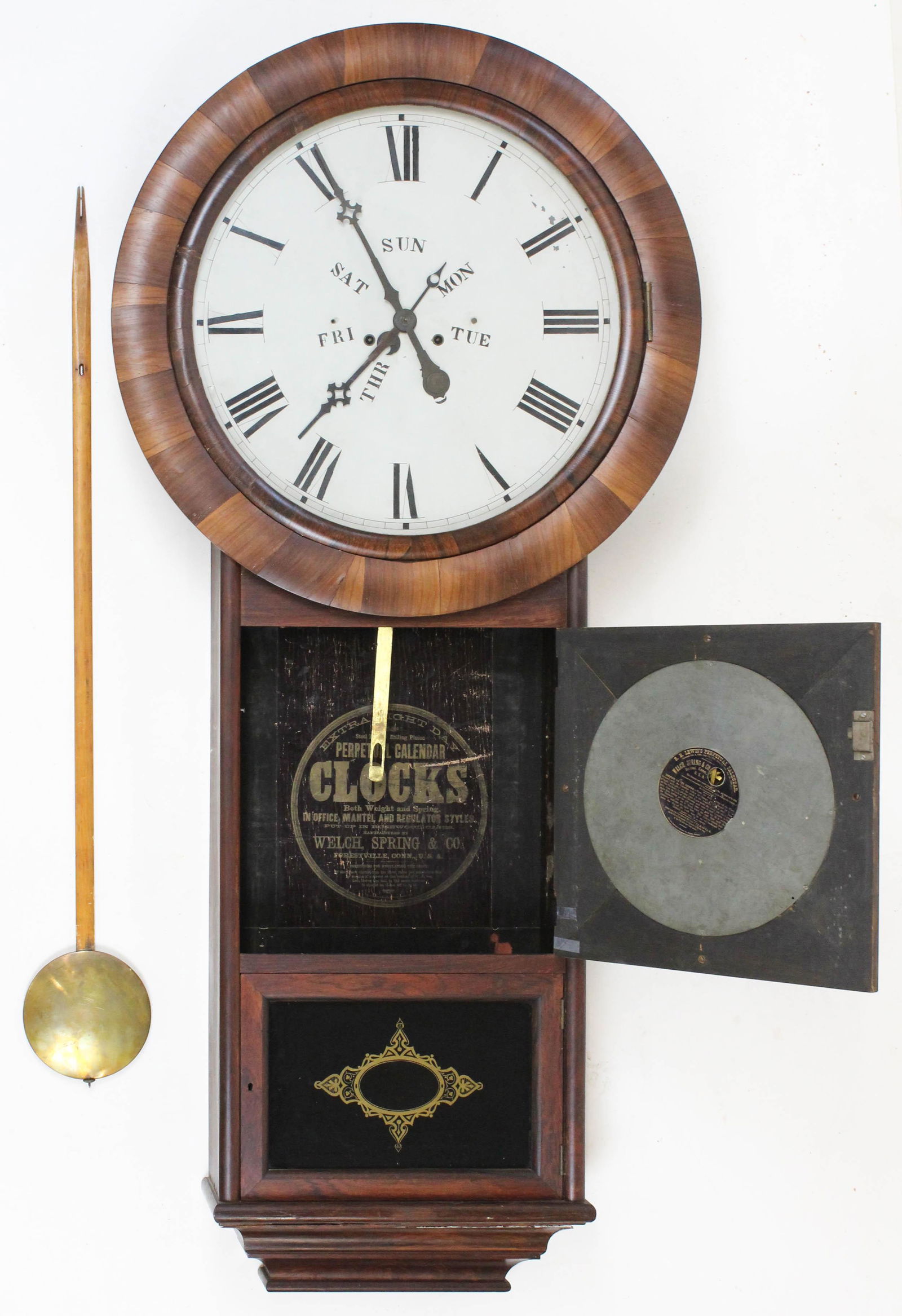 Welch, Spring, & Co #1 Calendar Wall Clock: Welch, Spring, & Co. #1 Perpetual Calendar wall clock, two dial swith 2 separate movements, rosewood case, long drop pendulum, ht 53"