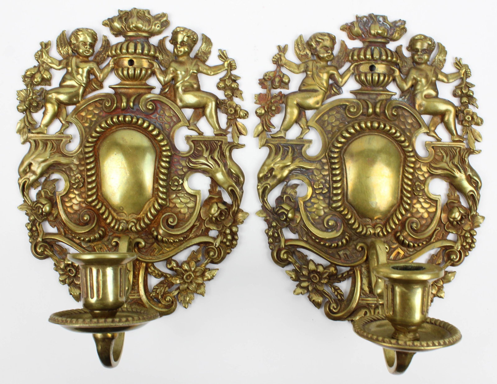Late 19th c Brass Candle Sconces: Pair of late 19th c brass candle sconces, decorated with putti, birds, & flowers, ht 11"