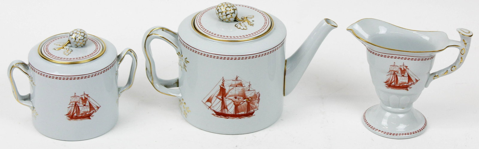 3 pc. Spode Trade Winds Porcelain Tea Set: 3 pc. Spode Historic Newport "Trade Winds" pattern export style porcelain tea set with iron red transfer depictions of early 19th c. American trade ships, consisting of wishbone handle tea pot, sugar 