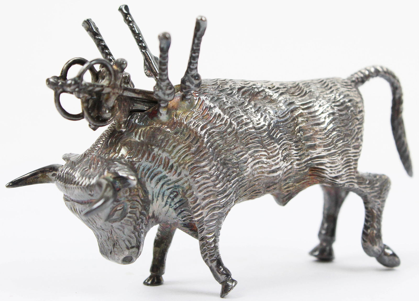Sterling Silver Bull Figure with Cocktail Picks: Sterling Silver Handwrought Charging Bull Figure with 4 sword form cocktail picks, marked .925, possibly Mexican 2"-3.5" 2.9 troy oz.