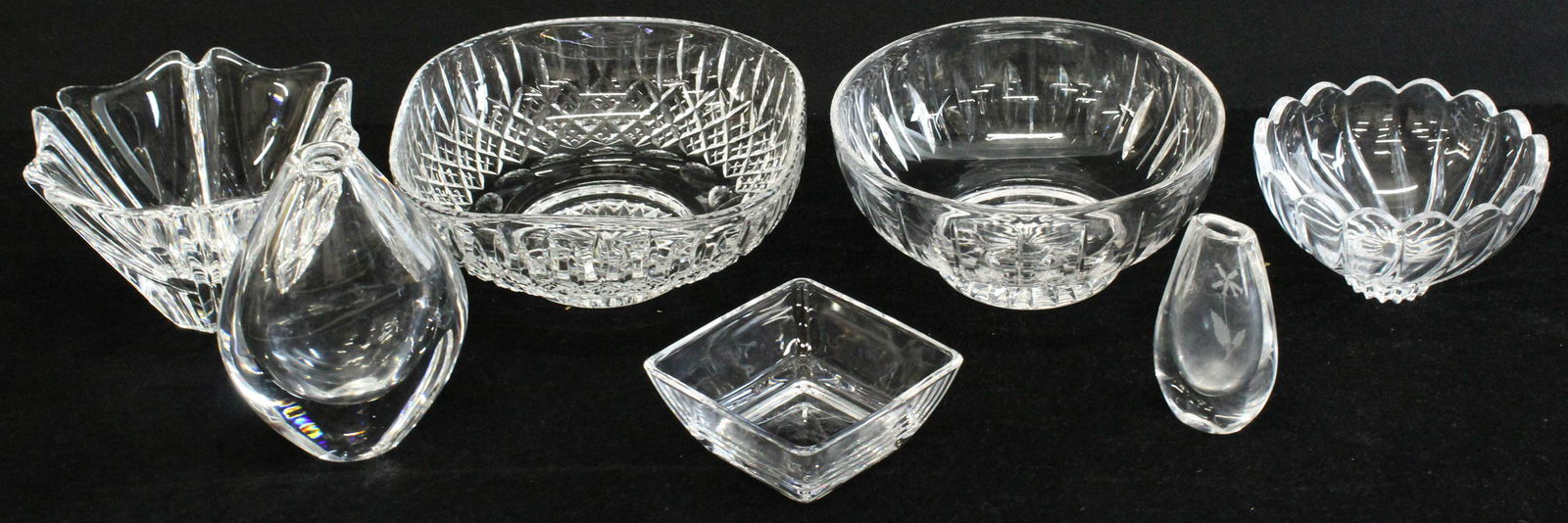 7 pcs. Contemporary Crystal incl. Orrefors, Stuart: Lot of 7 pcs. Contemporary Crystal tableware including 2 signed Stuart English crystal centerpiece bowls, signed Orrefors bowl and two vases, Nachtman square dish, swirl bowl 2"-7"