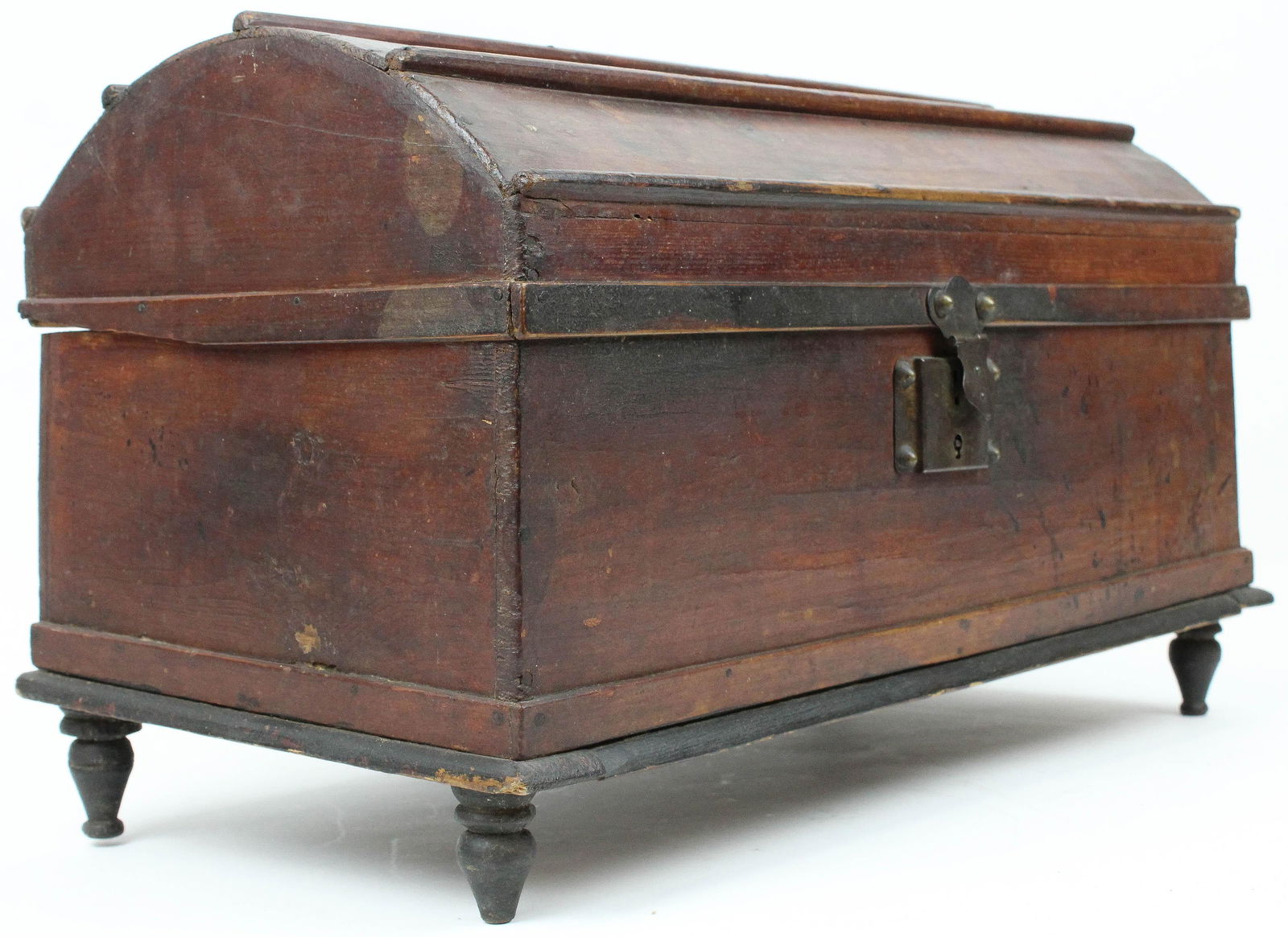 Late 19th c Wooden Dome Top Box: Latte 19th c wooden dome top box, wire hinges, old surface, turned legs, remains of red & black grained paint, 20 1/2" x 12 1/2" x 11"
