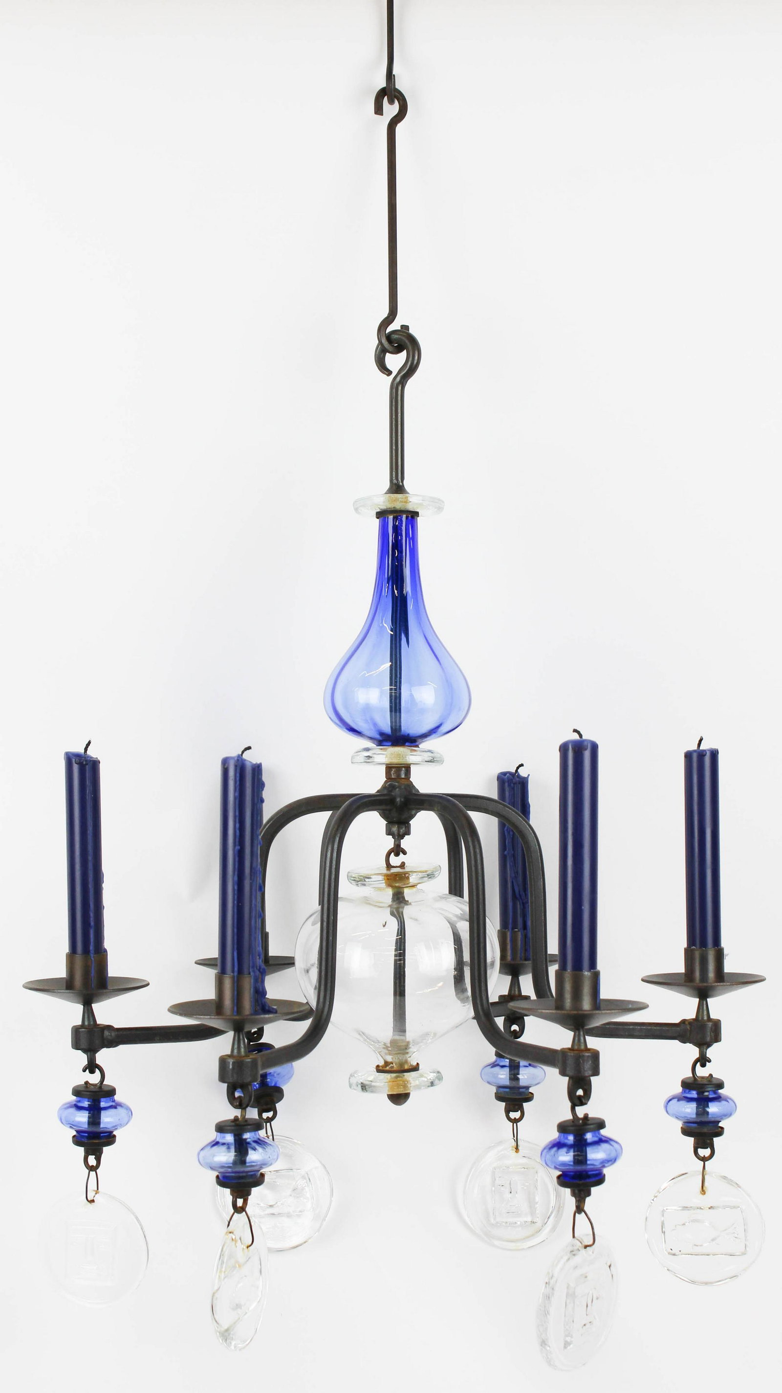 Erik Hoglund Glass Chandelier: Erik Hoglund (Swedish 1932 Boda Glass Works) blue & clear glass and iron chandelier, width 18", ht 24". One pendant shows a small loss (see photo), else in fine condition.