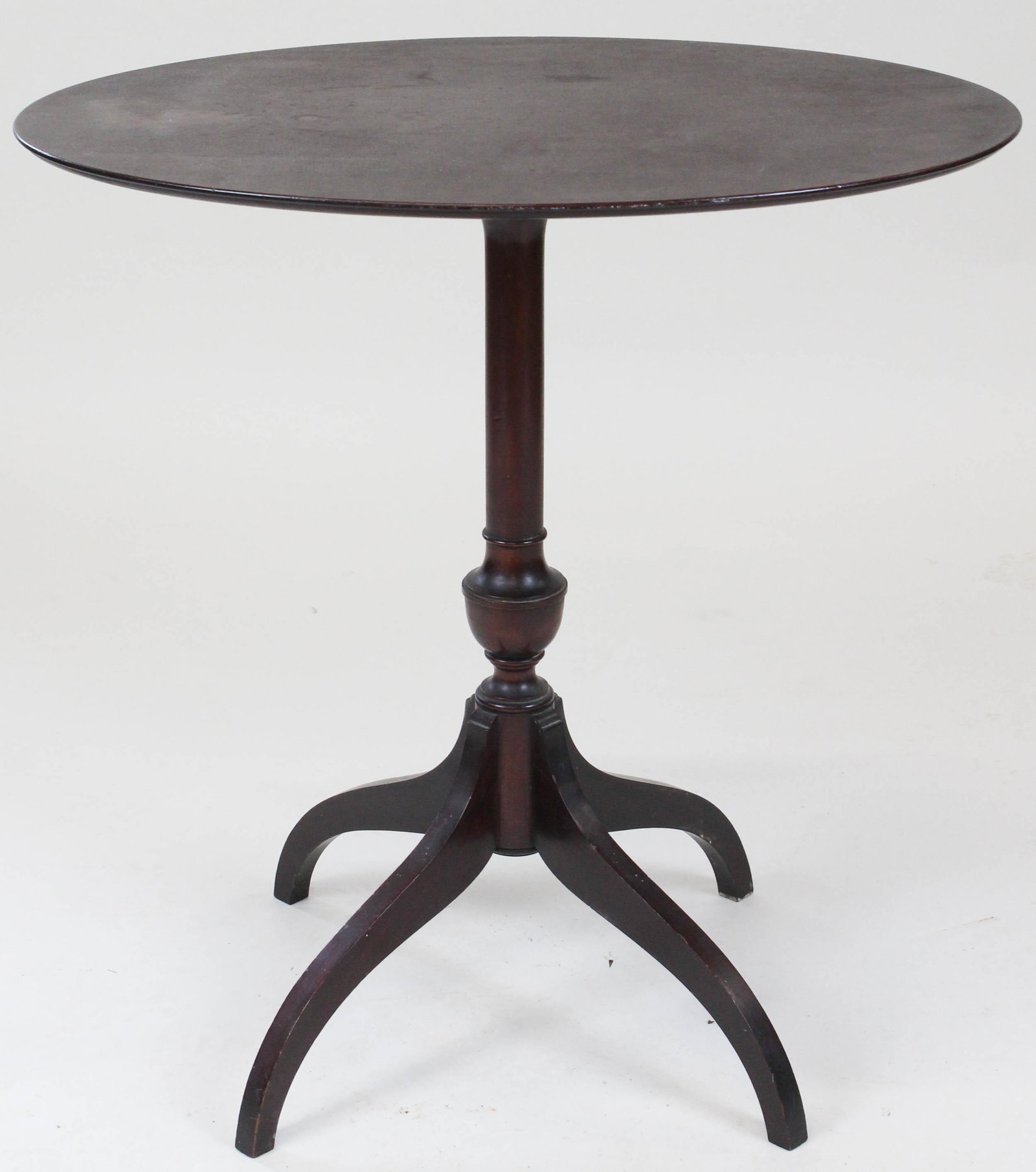 Hepplewhite mahogany oval candle stand: Hepplewhite mahogany oval candle stand. Spider legs, mid 20th c . 28" long oval, 29" h.
