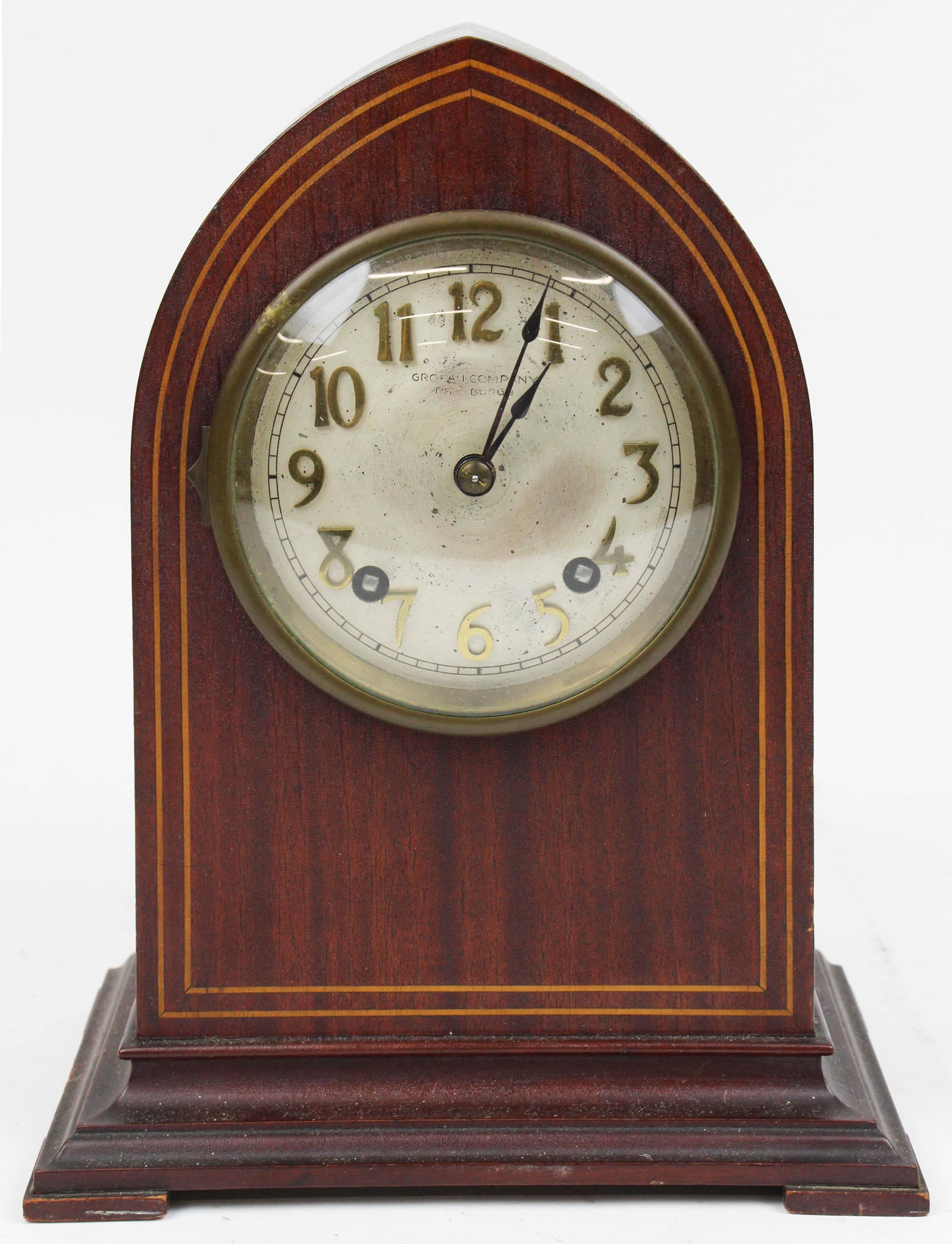 Grogan Company, Pittsburgh Shelf Clock: Grogan Company, Pittsburgh mahogany inlaid shelf clock, brass works made in Germany, ht 11 1/4", name on dial worn