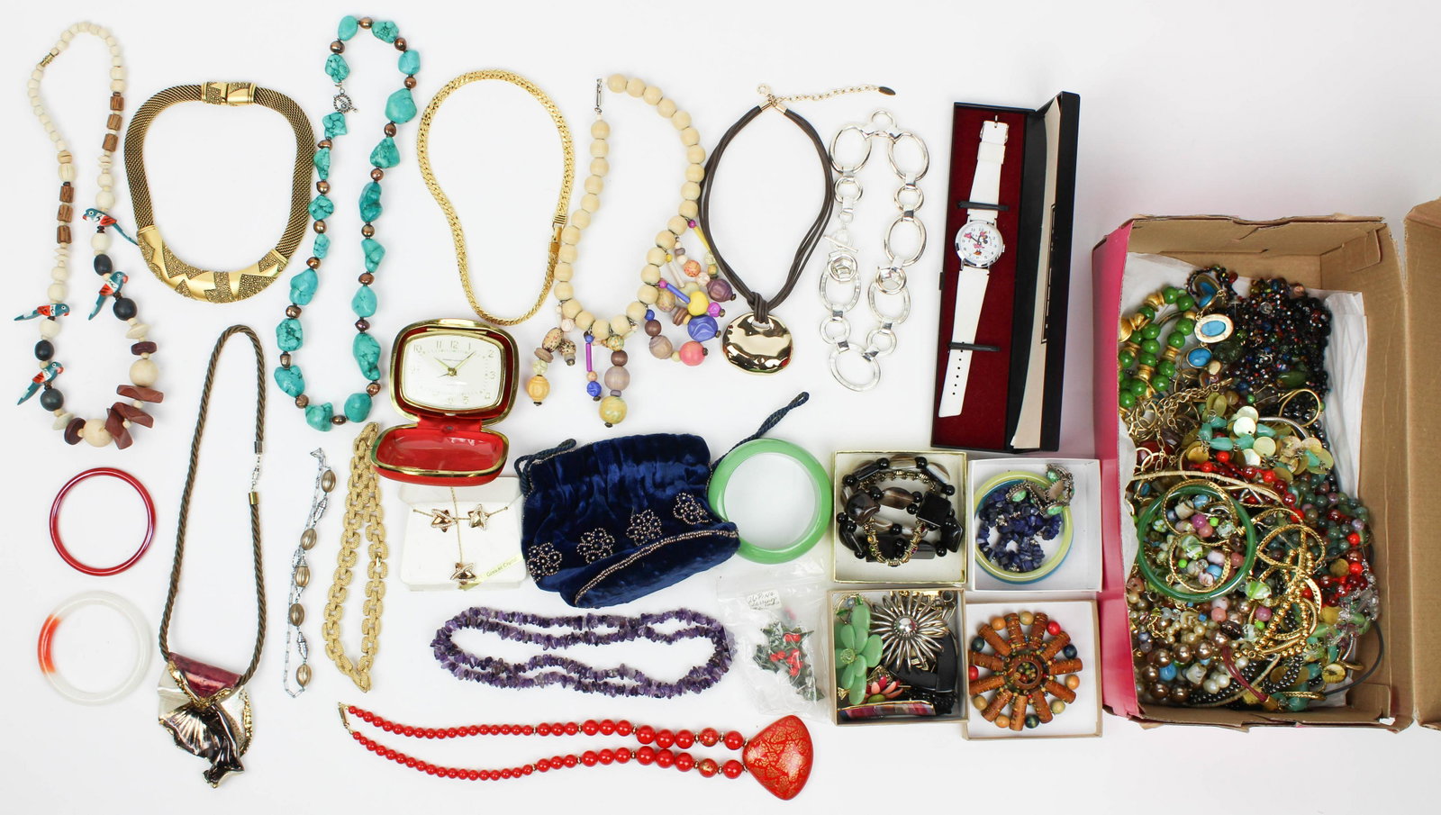 Large lot costume jewelry: Large box lot of costume jewelry including Bradley watch, beads, sterling, jade bracelets, raw lapis necklace, and more.
