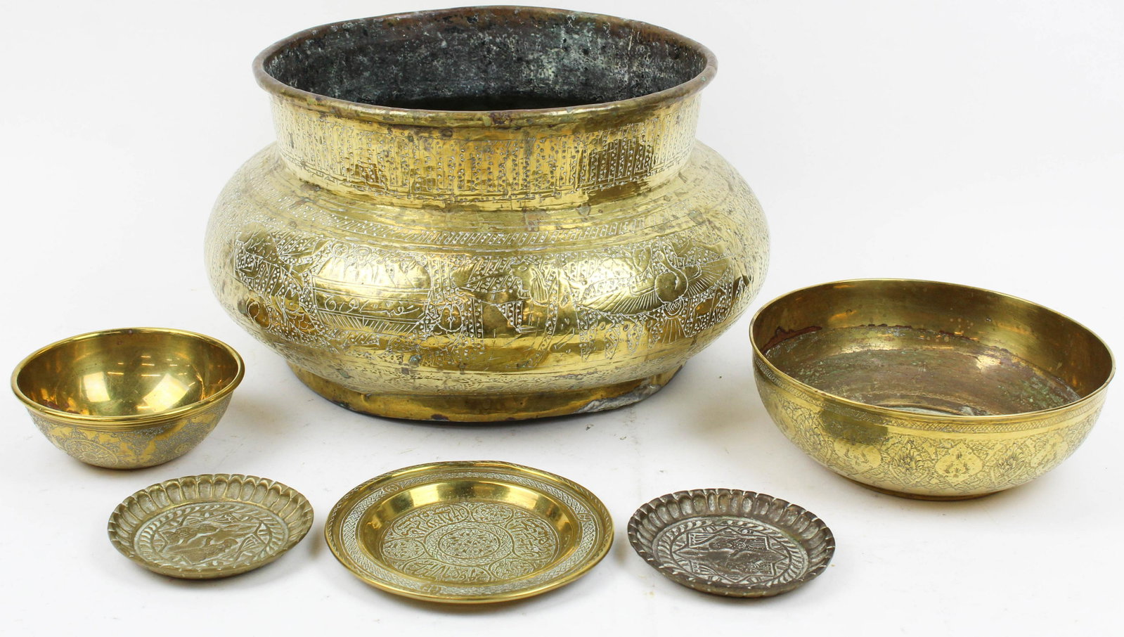 6 Middle Eastern Brass Pieces: 6 Middle Eastern brass pieces, including small Damascus dish with Islamic inscriptions, large Egyptian hammered brass pot with pyramids & figures, etc, largest piece 14 1/2" diameter