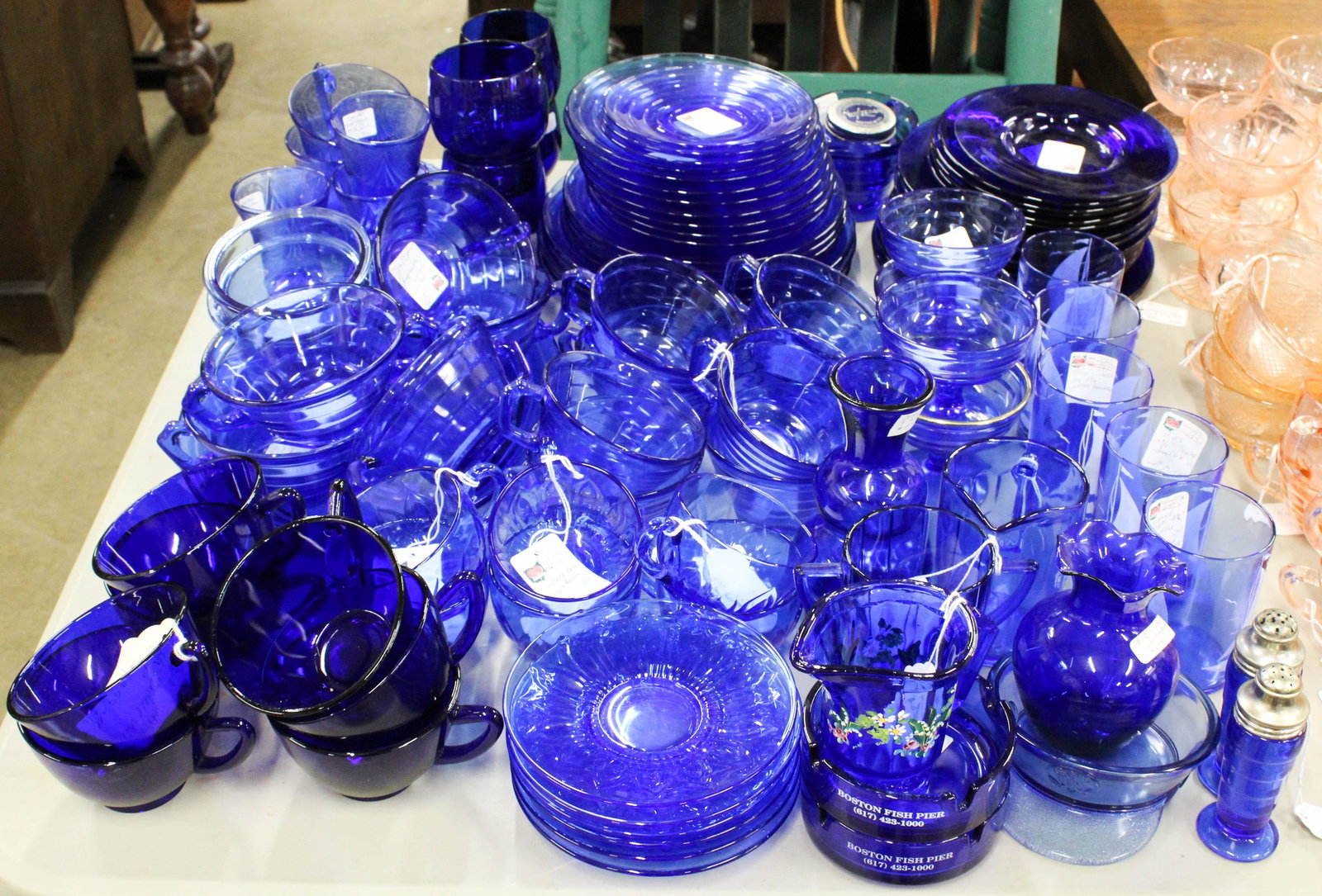 104 pcs Cobalt Blue Depression Era Glass: approx. 104 pcs Cobalt Blue Depression Era Glassware in various patterns, to include Modern Tone, Royal Lace, "Ships" (sail boat) tumblers, to include luncheon plates, tumblers, bouillion soups, cups,