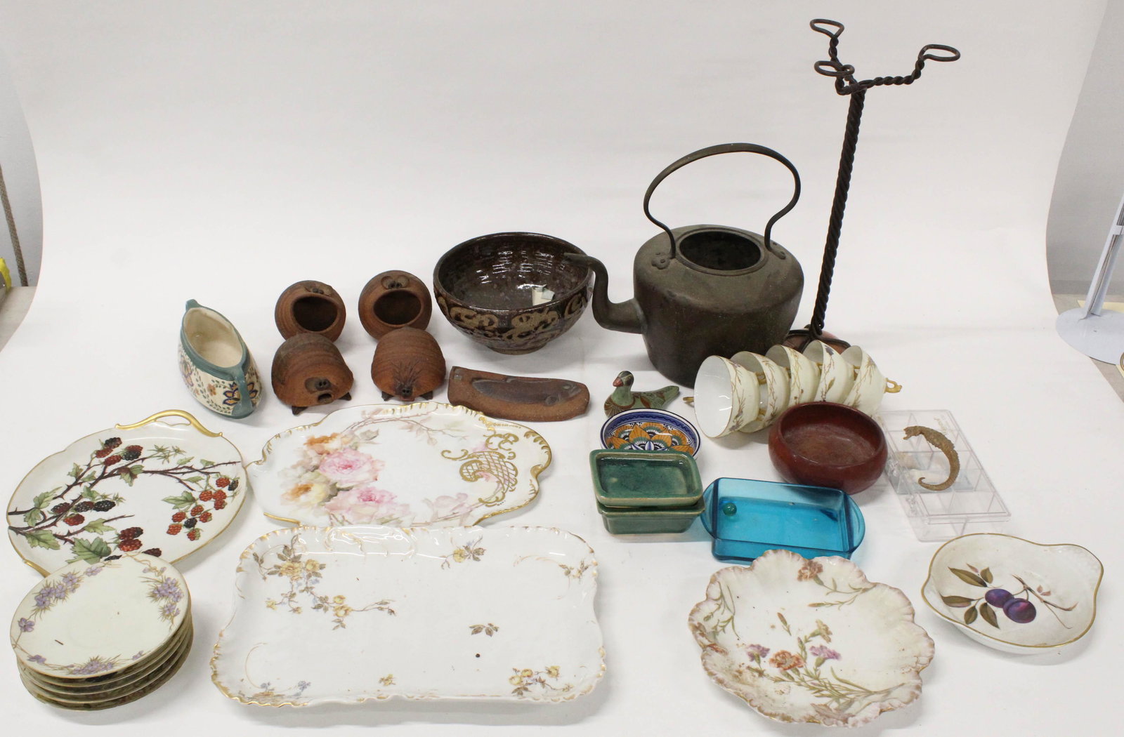 Estate Lot of Copper, Porcelain and Accessories: Estate lot including Limoges porcelain teacups and luncheon plates, early dovetailed copper kettle (missing lid), copper and steel candleholder, pyro decorated pantry box, silverplated flatware, 1970'