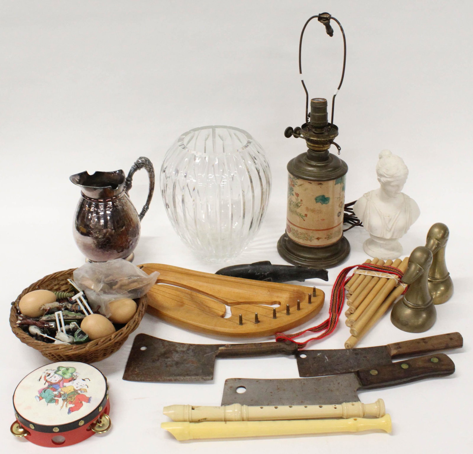 Lot of Mixed Accessories and Glassware: Lot of Mixed Accessories and Glassware including large lead crystal contemporary vase, Japanese Satsuma Porcelain table lamp, tribal musical instruments, classical female Parian bust, brass duck booke