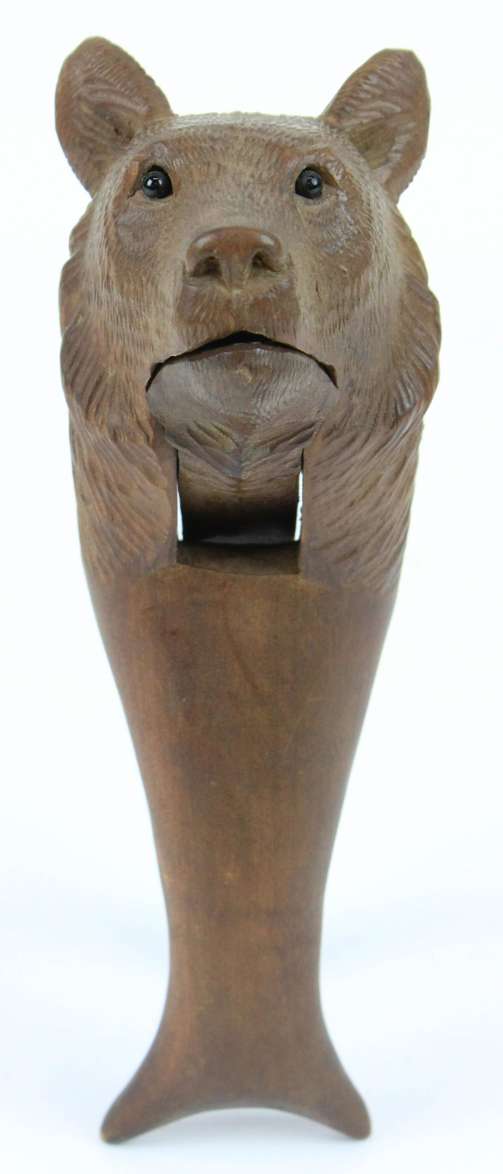 Early 20th c Carved Bear Nutcracker: Early 20th c carved bear nutcracker, glass eyes, length 7 1/4"