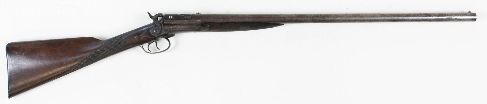 Ethan Allen Breechloading Shotgun in 12ga: Ethan Allen Worcester Mass -12 gauge, 26" barrels, SN 172 Trapdoor breech fitted with a locking lever with the serial number on the inside. The breech trapdoor is marked Ethan Allen & Co. Worcester Ma