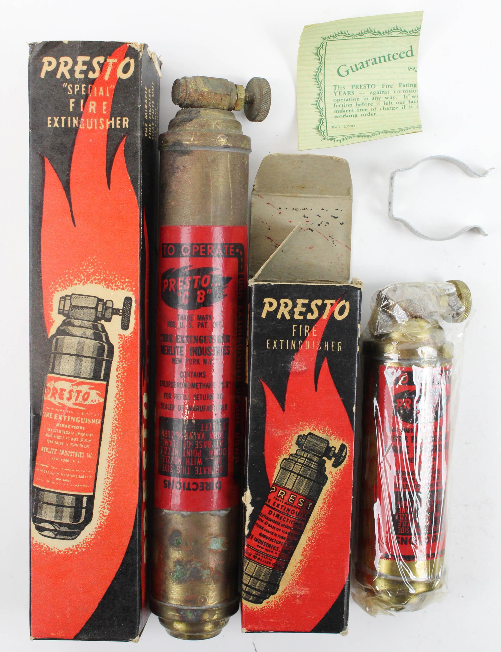 2 Presto CB Fire Extinguishers: Presto "CB" fire extinguishers (2 pcs), one NOS new old stock unused, with original boxes, used in motorcycles including Harley Davidson, lengths 9 1/2", 6"