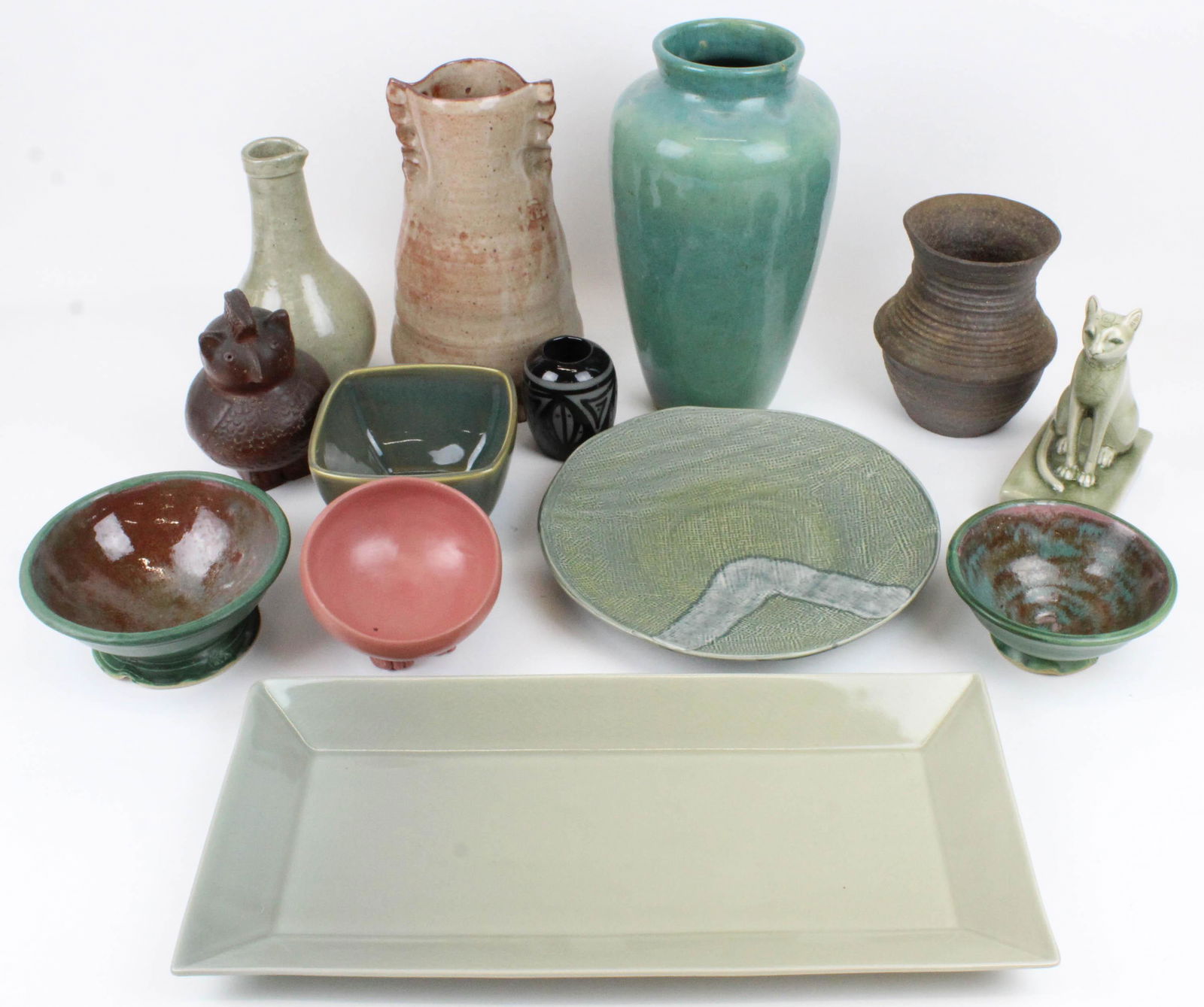 Lot of Contemporary Studio and Art Pottery: Lot of Contemporary Studio and Art Pottery including Simon Pearce celadon crackle glaze tray, lg. turquoise glaze vase, redware vessel, small Navajo vase, green matte bowls, etc.