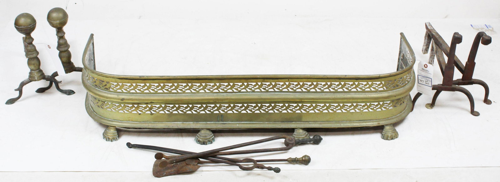 Brass Fender, Early Andirons & Fireplace Tools: Brass fireplace fender, early andirons & fireplace tools, width 48"