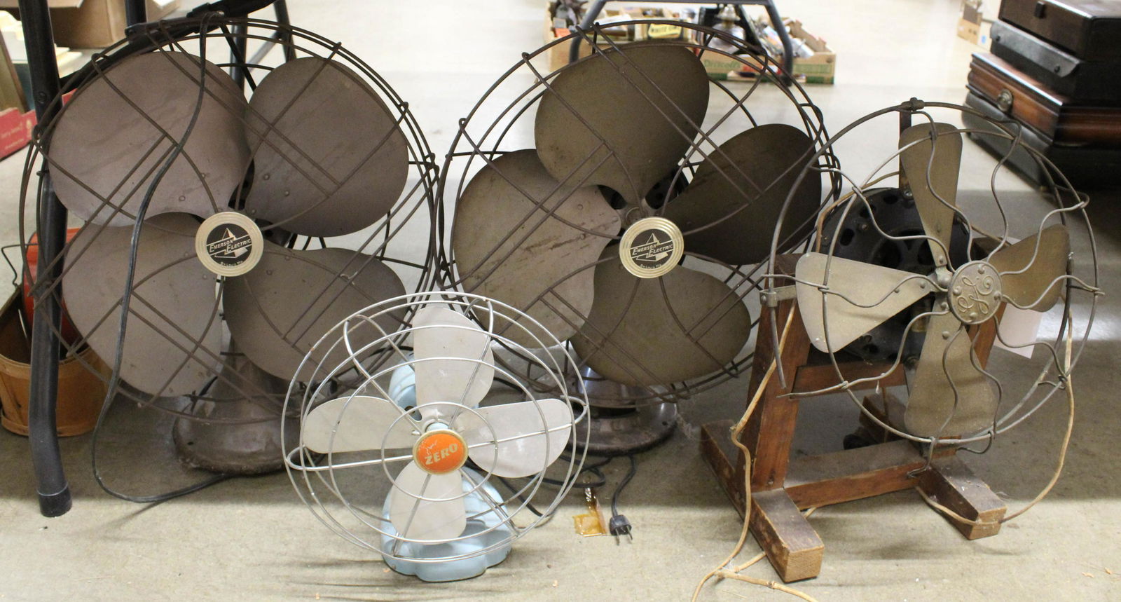Group of 4 Vintage Electric Table Fans: Group of 4 Vintage Electric Table Fans including 2 1940's Art Deco Emerson fans, Zero retro fan with powder blue base, and General Electric brass blade fan with made-do wooden base ht. 13.5" -21"