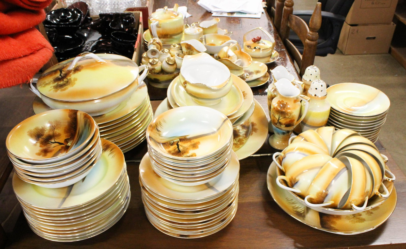 112 pcs Noritake Tree in the Meadow Porcelain: 112 pcs. Noritake "Tree in the Meadow" pattern handpainted autumn scenic landscape decorated porcelain dinnerware, including tea pot, cocoa pot, preserve jar, mayonnaise dish, sauce boat, covered serv