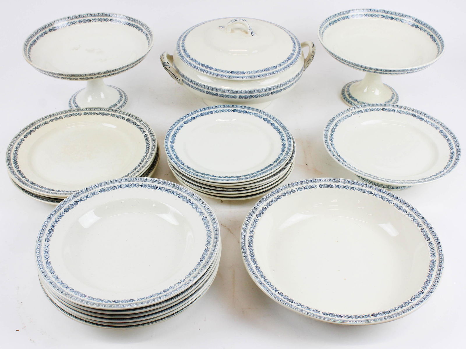 22 pcs. Boch Freres Villeroy and Boch Dinnerware: 22 pcs. Boch Freres/ Villeroy and Boch Belgium 19th c. porcelain dinnerware with dark blue transfer Grecian frieze border, including two compotes, covered serving dish, 6 soup plates, footed cake plat