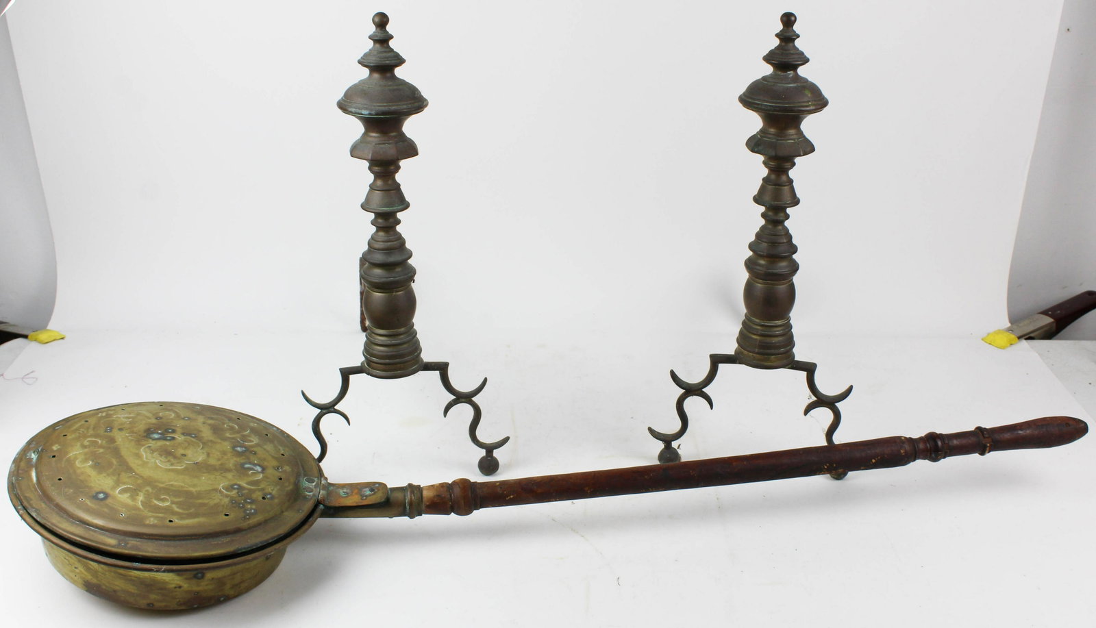 18th c Brass Bedwarmer, Early 19th c Andirons: 18th c brass bedwarmer, sold with an early 19th c pair of brass andirons, ht 19 1/2"