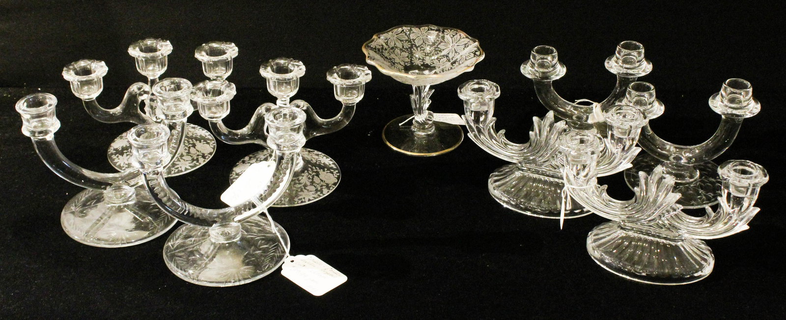 Elegant Depression Era Candelabra and Compote: Group of 4 pair of Elegant Depression Era Glassware candelabra including etched Cambridge "Wild Flower", Fostoria, two with wheel etched bases, accompanied by a Fostoria Baroque compote ht. 4.5"-6"