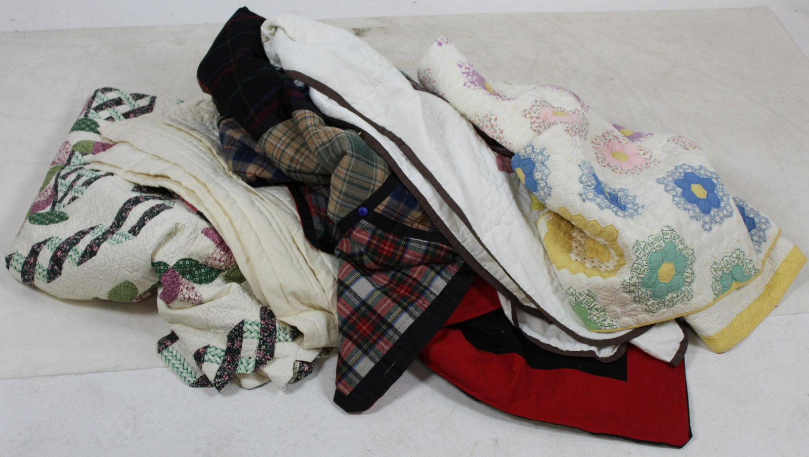 Five 20th c Quilts: Twin Sized Wedding Band Quilt, Circa 1990 Crazy quilt made from Woolen Shirts, Butterfly quilt etc.