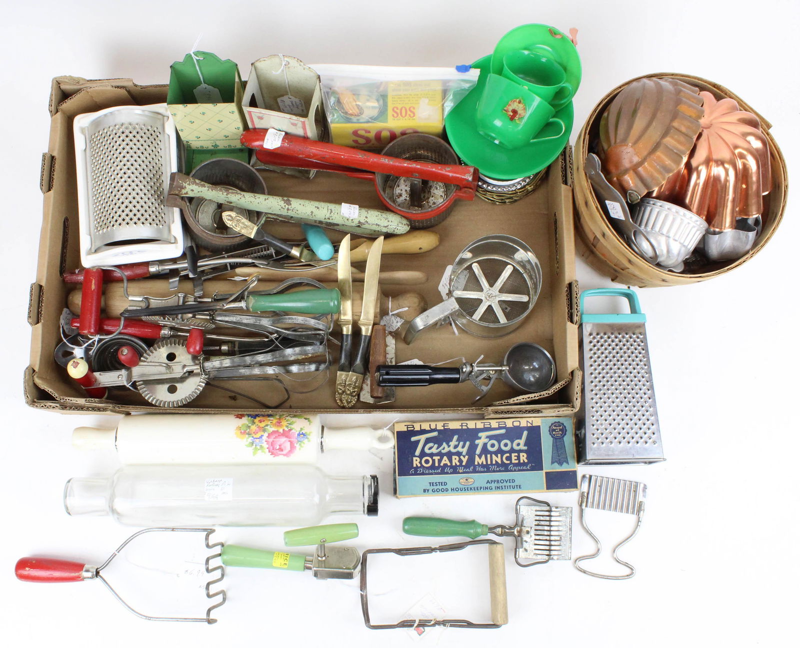 Lot of Vintage Kitchenware and Utensils: Lot of Vintage Kitchenware including copper molds, jade green handled utensils, graters, rolling pins, coasters, tin litho match safes, cookie cutters, etc.