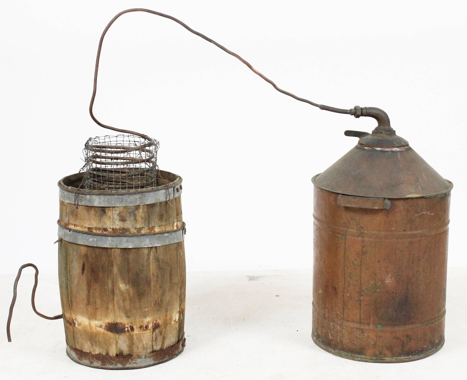 Prohibition Era Homemade Copper Still Apparatus: ca. 1930 Prohibition Era homemade moonshine copper pot still with column and condenser, found in an old St. Johnsbury, VT carriage barn 28" x 38" overall