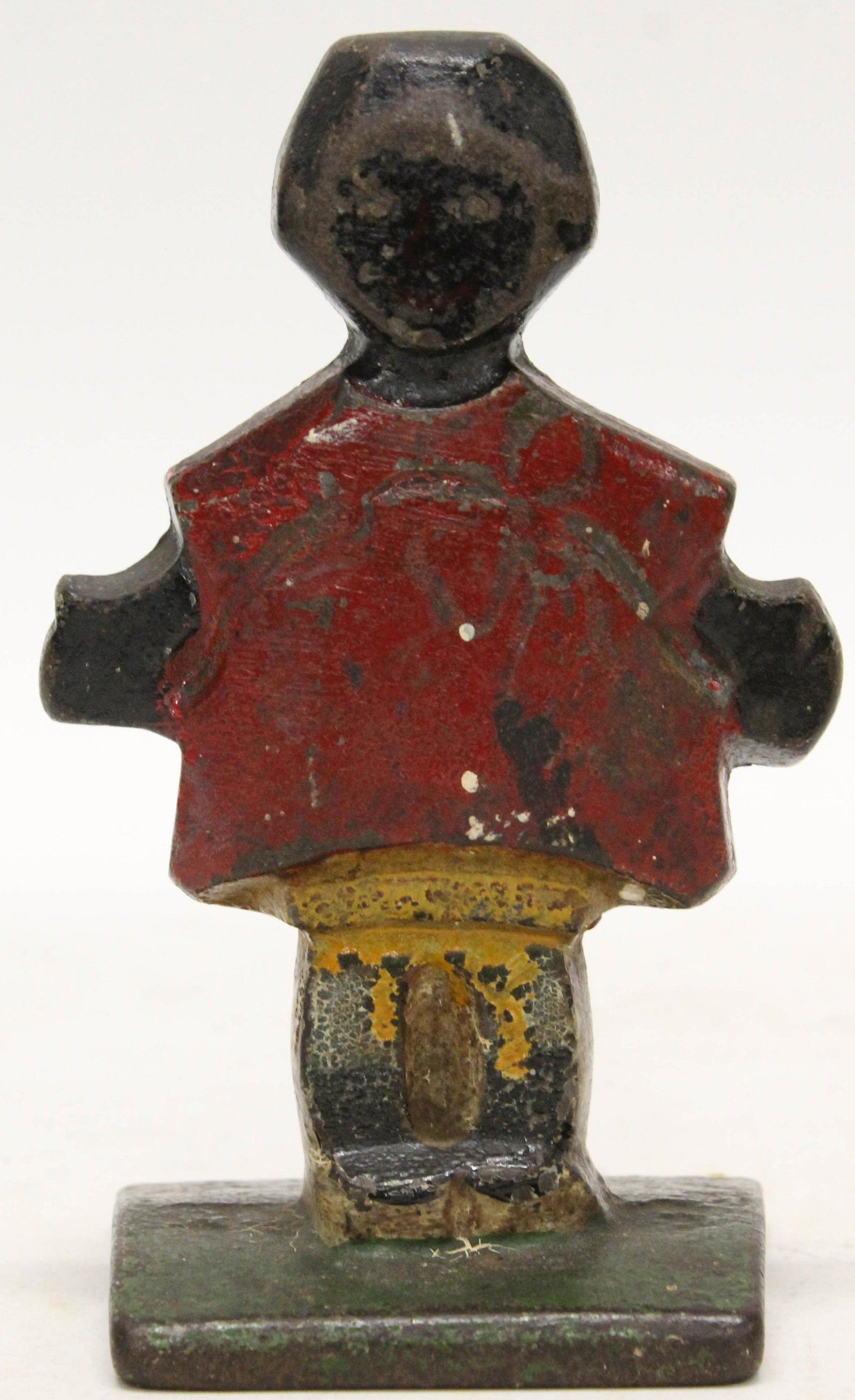 Rare Topsy Hubley Red Dress Cast Iron Doorstop: Rare cast iron doorstop of black girl. Topsy, Hubley, unusual red dress type. Wedge stop. 6 1/4" h.