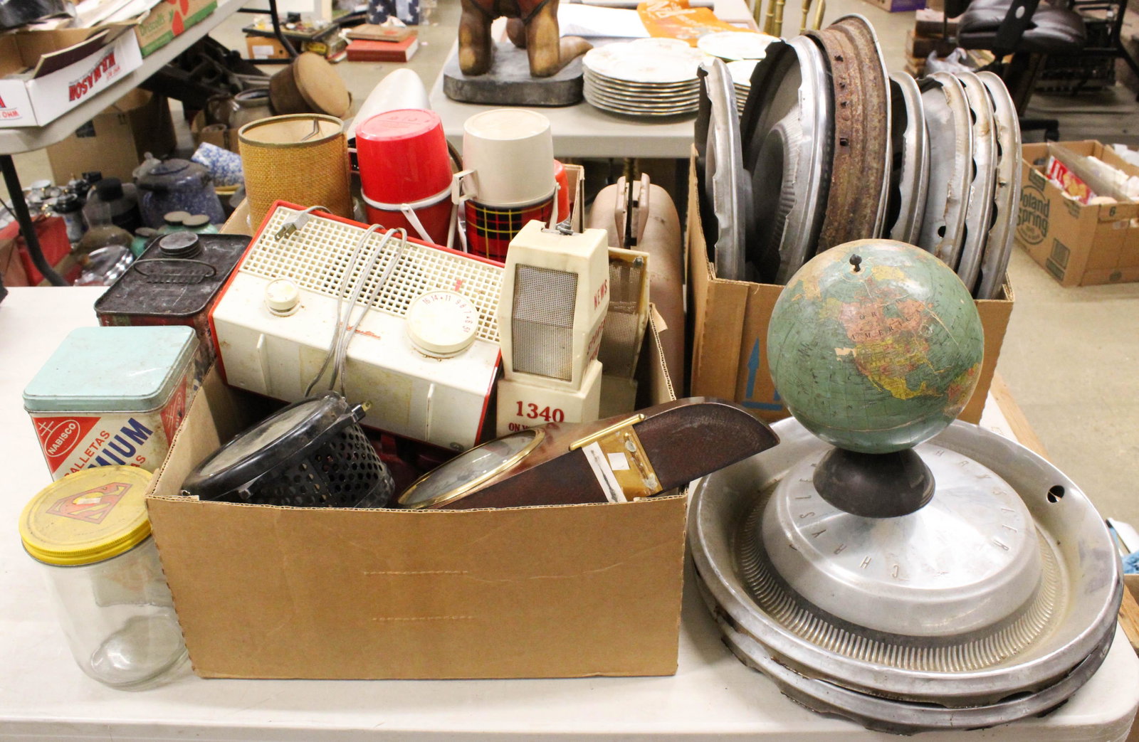 Estate Lot of Vintage 1950's Clocks and Kitsch: Estate Lot of Vintage items including 6 Motorola dealer advertising tumblers, Silvertone red and white radio, red rotary telephone, Sessions electric mantel clock, tartan plaid metal themoses, hubcaps