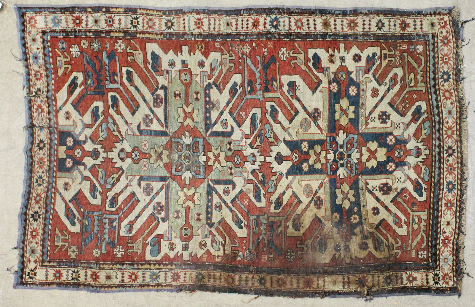 19th c Eagle Kazak Area Rug- as found: 19th c Eagle Kazak area rug- as found, fragile area with losses, stains, other tears, old rebinding on edges, 4' 2" x 6' 4"
