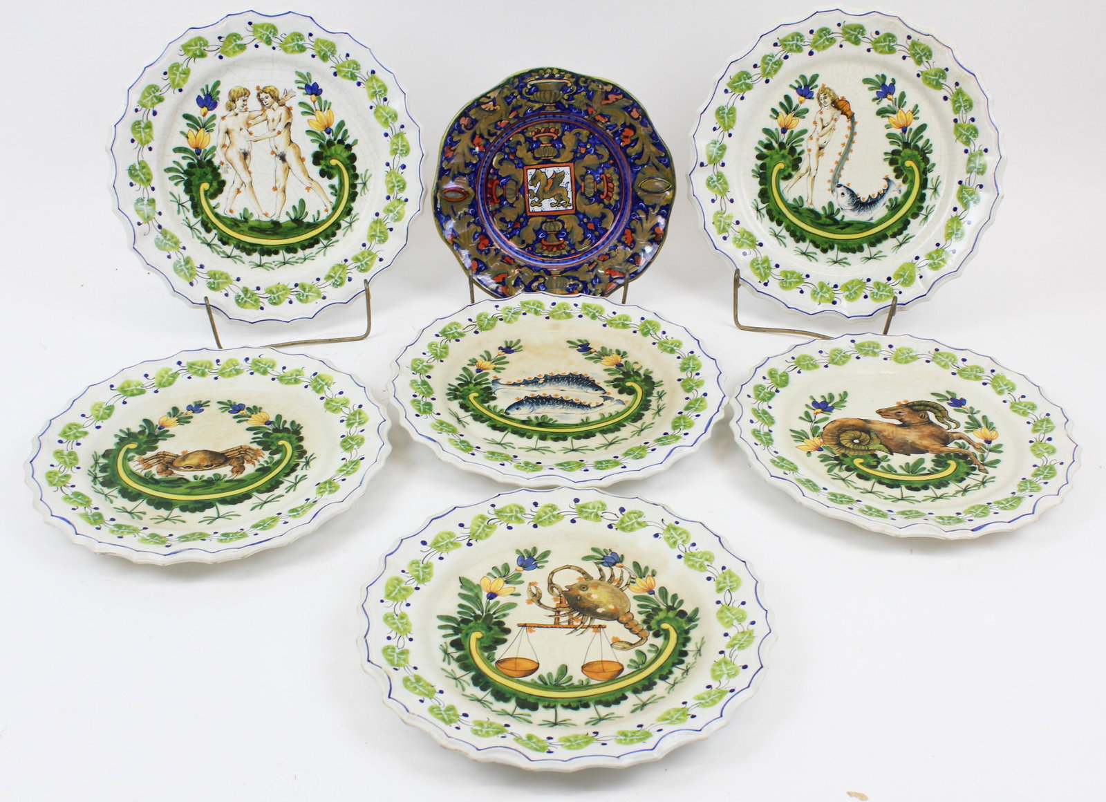 6 Costa Bassano Italian Faience Zodiac Plates: Set of 6 Costa Bassano Italian Faience diner plates having scalloped rims and finely detailed majolica glazed scenes of Zodiac symbols 11" -some crazing glaze flakes, accompanied by another Florentine