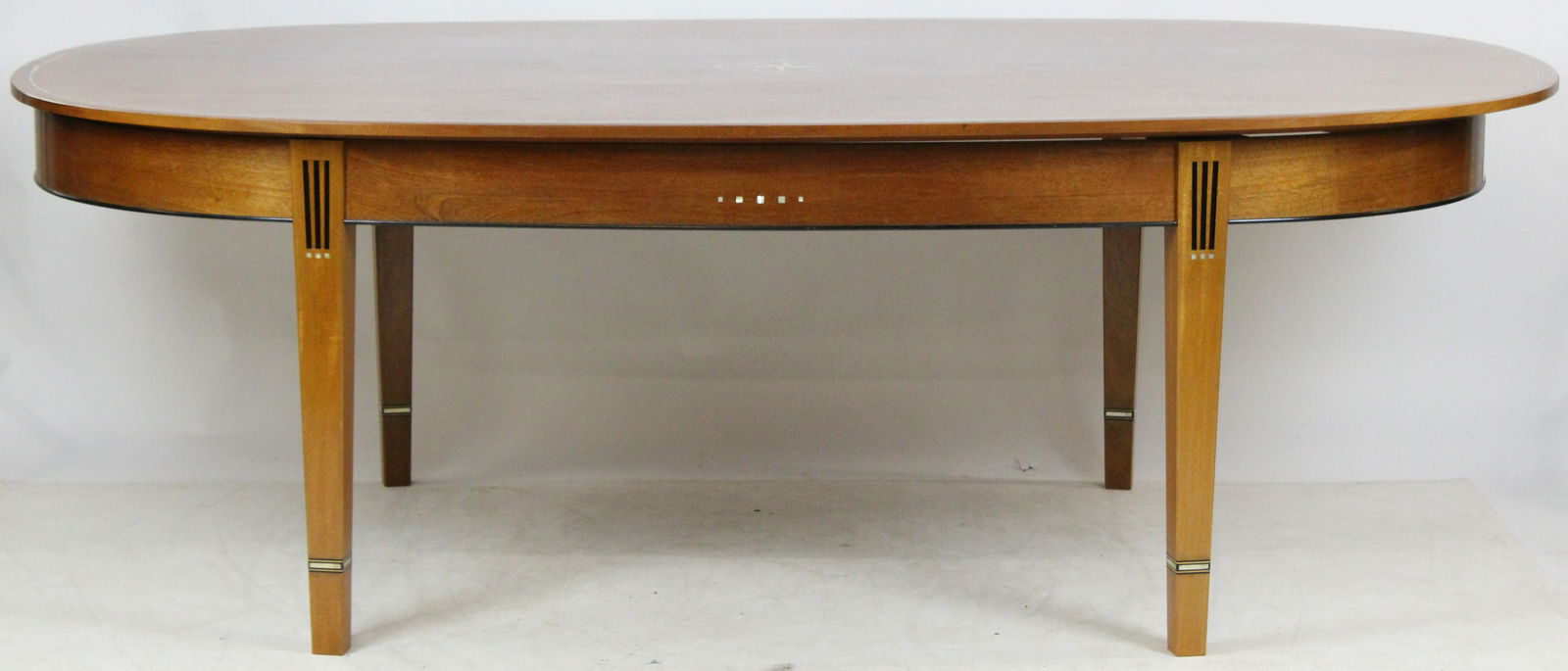 Contemporary Vermont dining table by Garrett Hack (Am.: Designed and built by renowned Vermont furniture maker, woodworking instructor, and author Garrett Hack, this exquisite contemporary dining table seats 6. Made of mahogany with details in ebony and mo