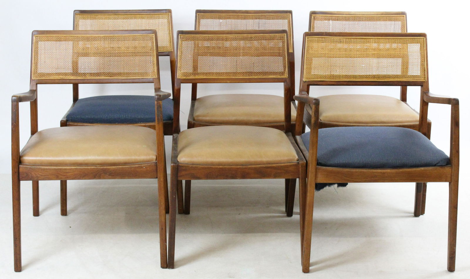 Set of 6 mid-century modern Jens Risom C140 "Playboy": Set of 6 mid-century modern Jens Risom C140 "Playboy" chairs, walnut with original caning, 4 of 6 with original upholstery, tags underneath. Sold to benefit the Brattleboro Museum & Art Center.