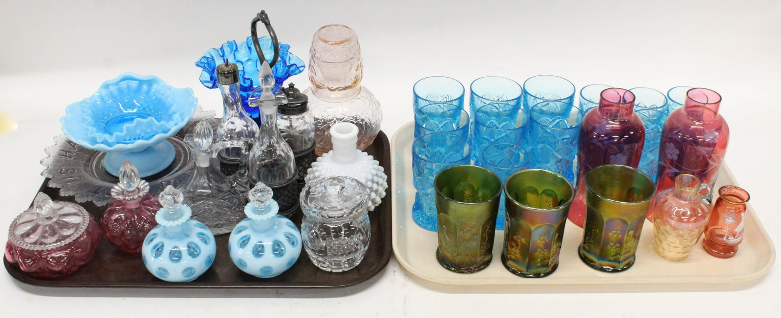 Group of Victorian Style Art Glass Tableware: Group of Victorian style art glass tableware including 14 blue pressed glass tumblers, pink depression glass tumble up, cut glass cruet set in silver-plated frame, 3 Northwood carnival glass tumblers,