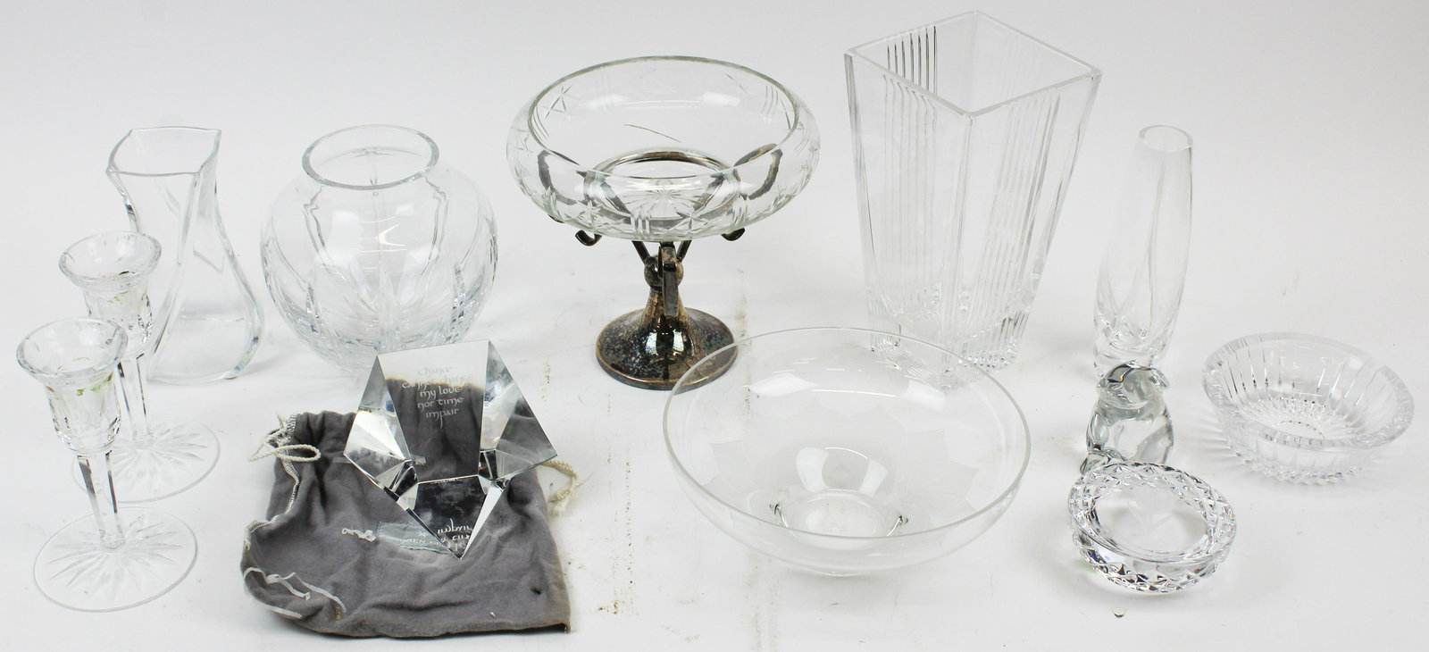 Lot of Crystal Items Incl. Baccarat, Steuben, etc: Group of 12 fine crystal art glass items including Steuben star form polygonal paperweight, Waterford rose paperweight, Baccarat rabbit figurine, Tiffany & Co. square vase, Rosenthal centerpiece bowl,