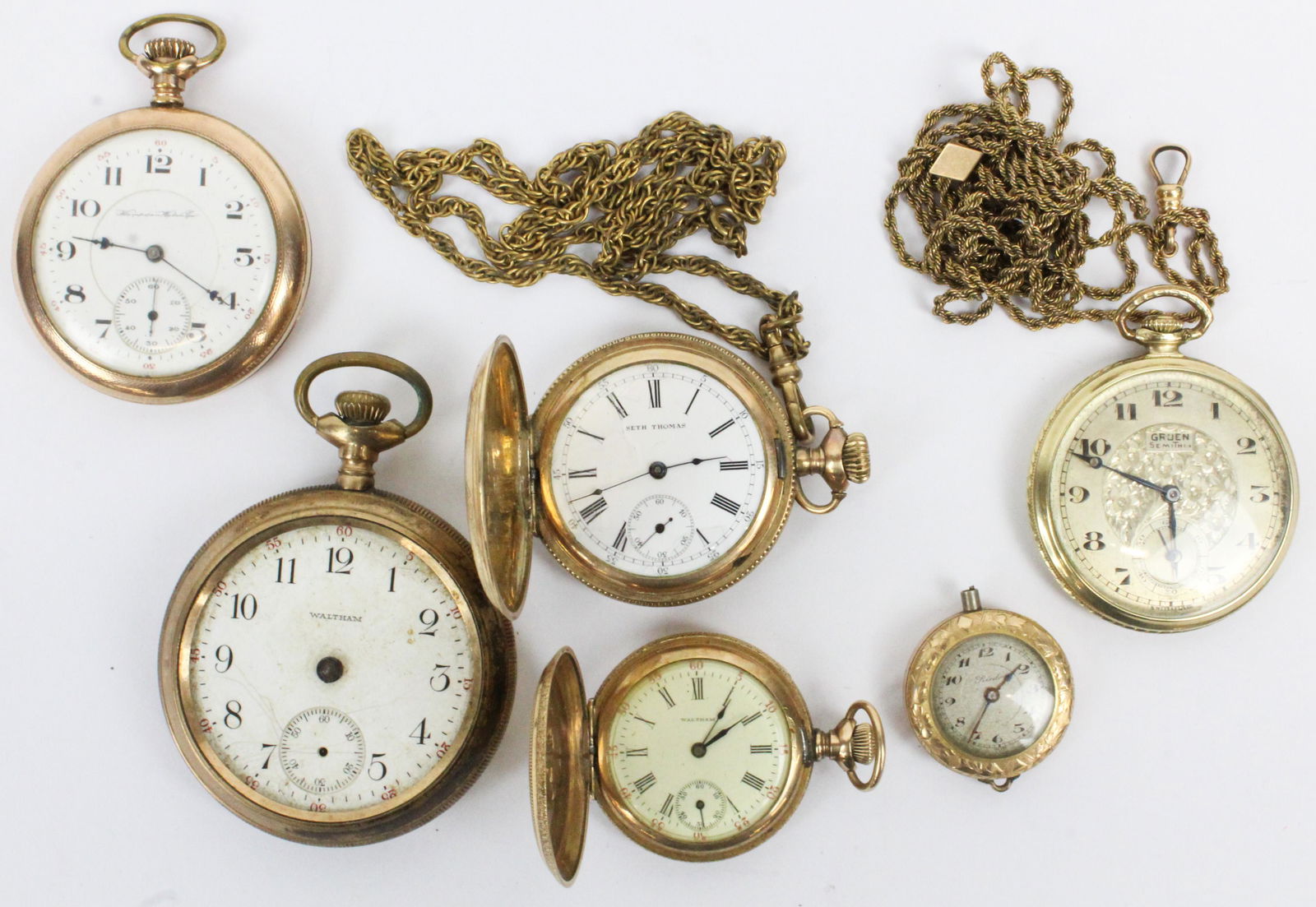 6 Gold Filled Pocket Watches: 6 gold filled pocket watches, including Gruen Semithin (running, but not warranted), Waltham hunter case ladies watch, etc