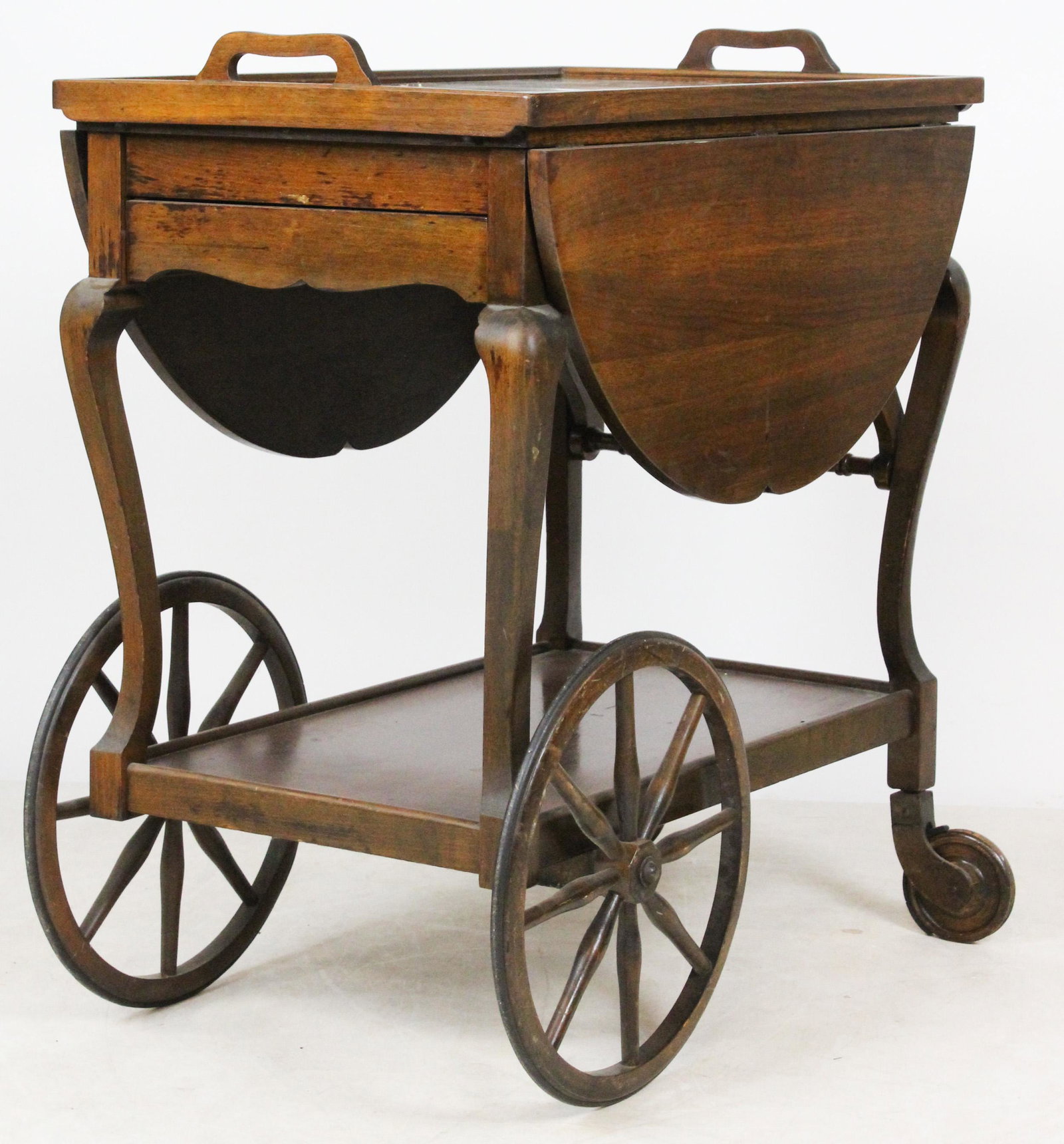 20th c Mahogany Tea Cart, Inlaid Stand: Mid 20th c glass tray top mahogany tea cart on wheels, length 27", ht 29", sold with a Mid 20th c glass tray top mahogany oval stand