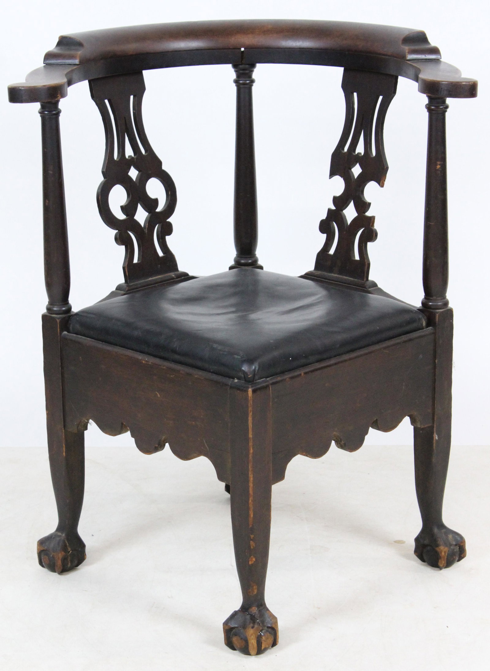 Centennial Era Chippendale Style Corner Chair: late 19th or early 20th c. "Centennial Era" Chippendale style colonial revival stained birch ball and claw foot corner chair with black leather slip seat, as found, some losses and damage to feet and 