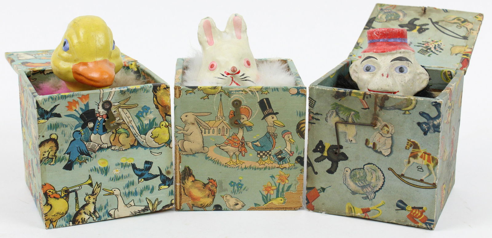 Three Japanese Jack in the Box Toys: Three pre-war Japanese jack-in-the-box toys- monkey, rabbit, & duckling, one box inscribed from Aunt Peg, 1937, 3 1/2" x 3 1/2" x 3 1/2"