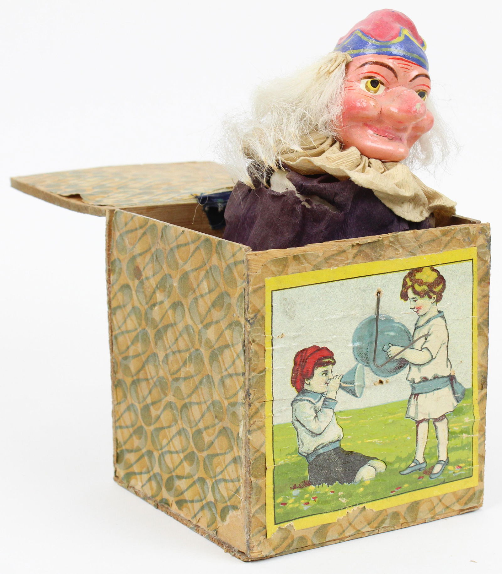 19th c Composition Jack in the Box Toy: 19th c German painted composition Punch jack-in-the-box toy, paper litho front, 5" x 5" x 5 1/4"