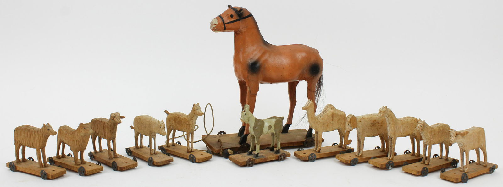 12 German Pull Toy Horses, Animals: 12 German pull toy horses, animals, lengths 3 1/2" to 7"