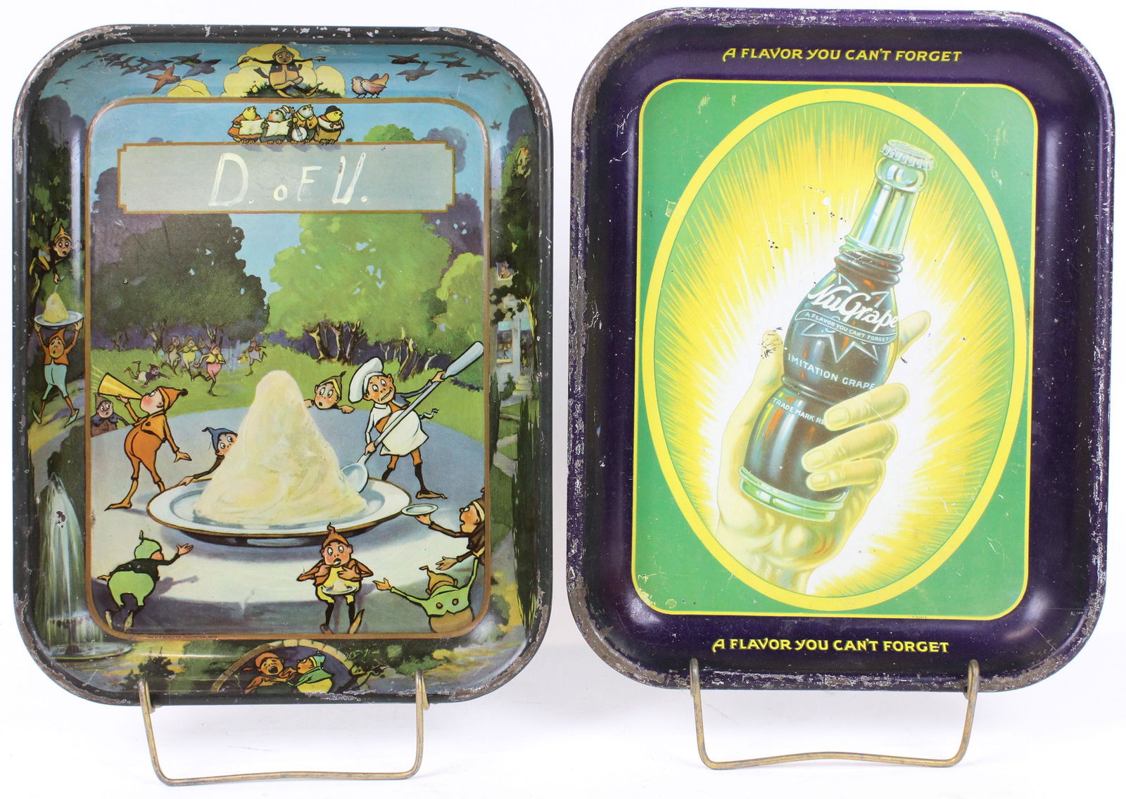 Two Ice Cream Parlor Trays: Ice Cream Parlor Tray with Brownies (initials painted on front), NuGrape Soda Fountain tray some wear, sunfade), both 13" x 10 1/2"