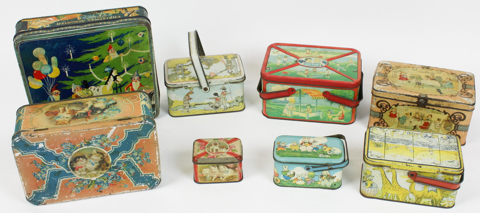Vintage Food Tins and Lunch Box Tins: Vintage food tins and lunch box tins (8 pcs), including Peter Rabbit, Christmas Elves, hts/ lengths 3 1/4" to 8 3/4"