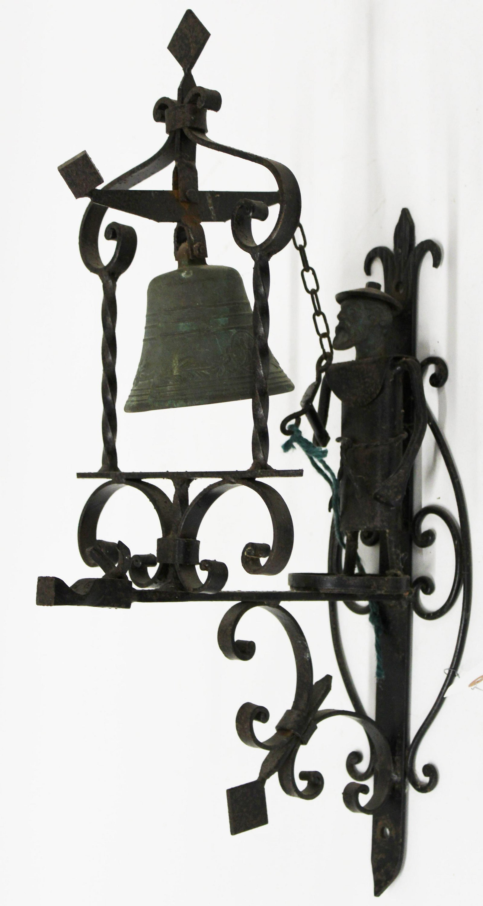 20th c Iron Mexican School Bell with Saint: 20th c Wrought Iron Mexican School Bell with cast bronze bell and saint's head. 20" overall