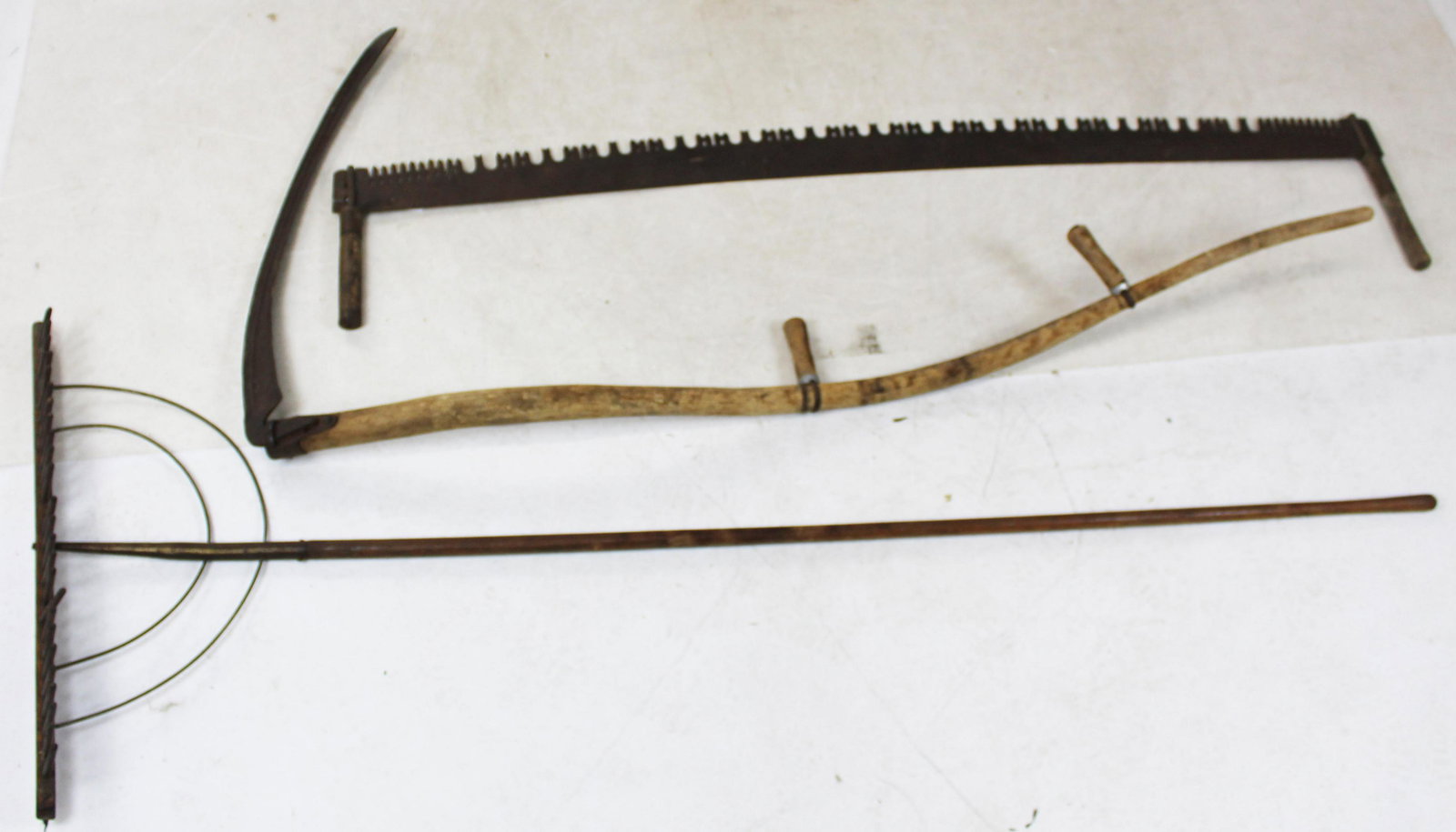 Lot of Tools: Scythe, two man saw and early rake